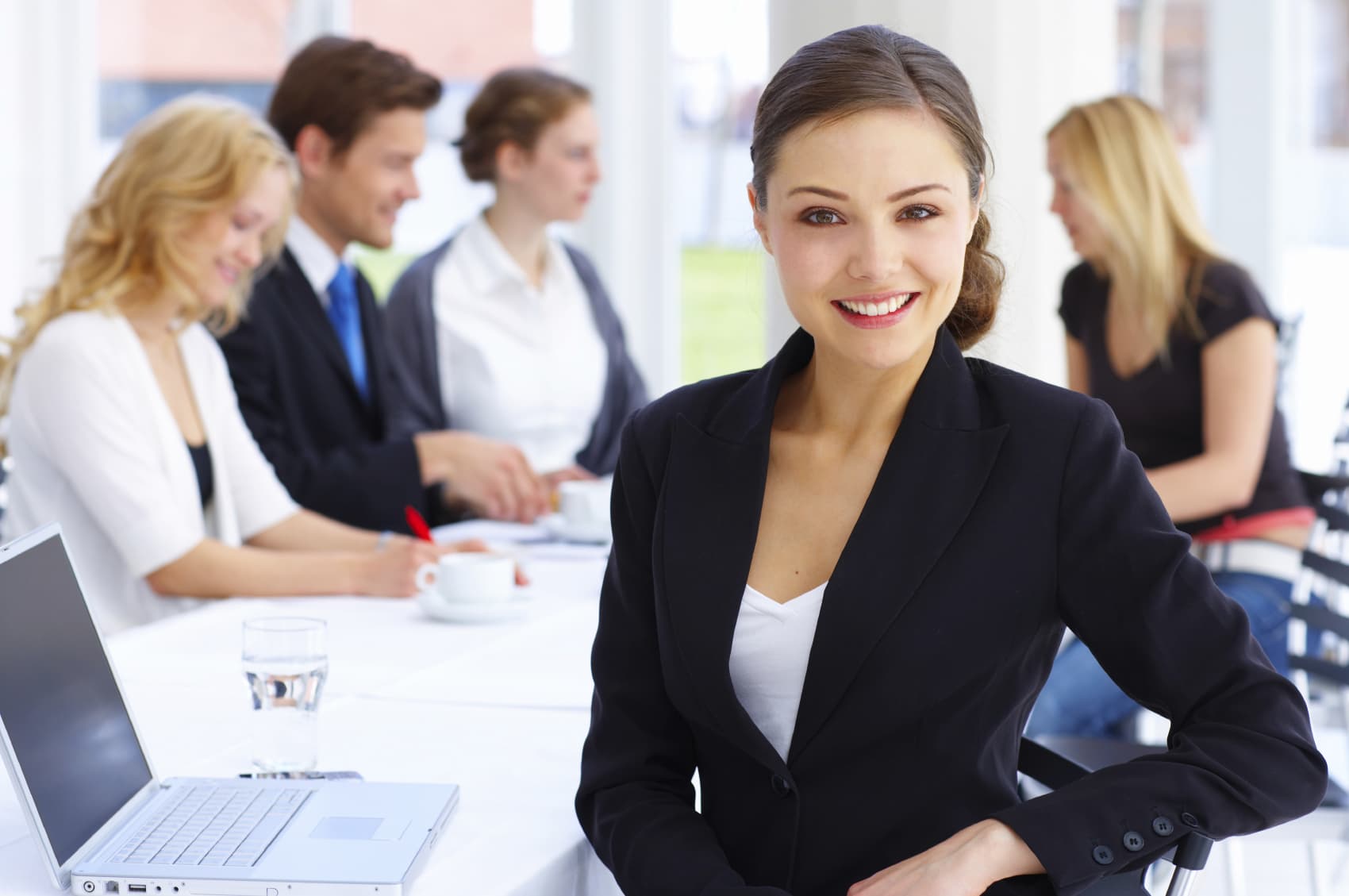 business-woman-table-group.jpg